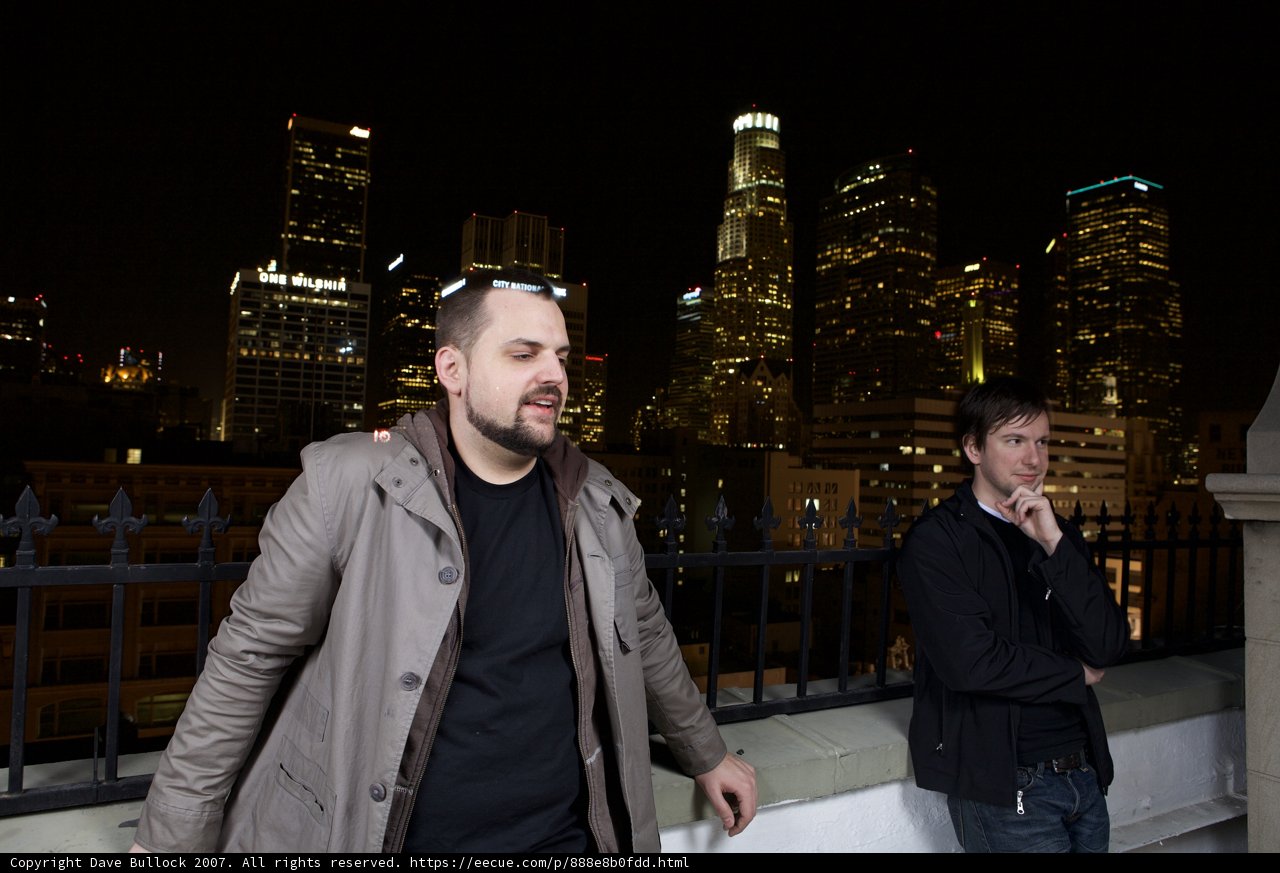 Two Men Enjoying The Cityscape