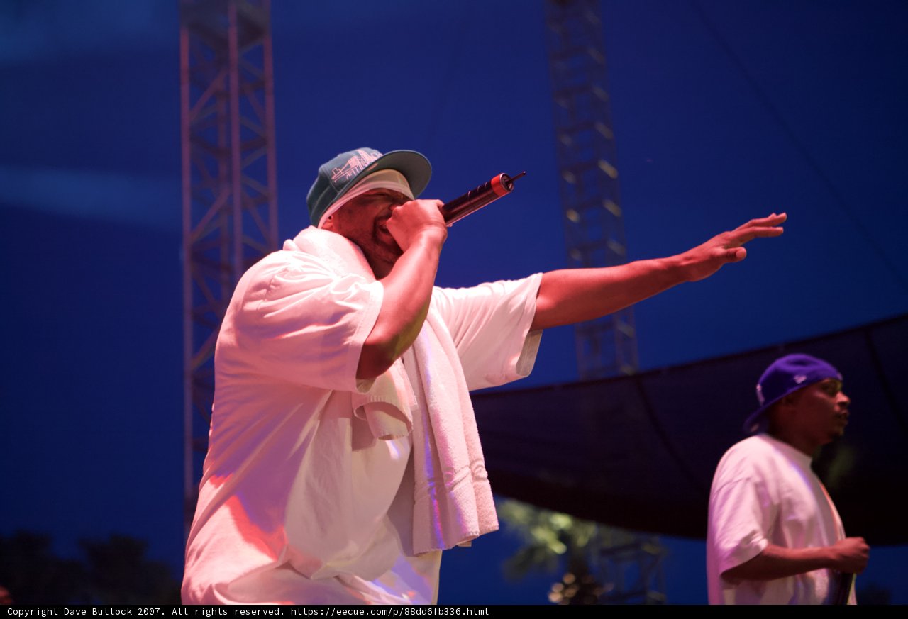 Stage Performer in White Shirt and Hat