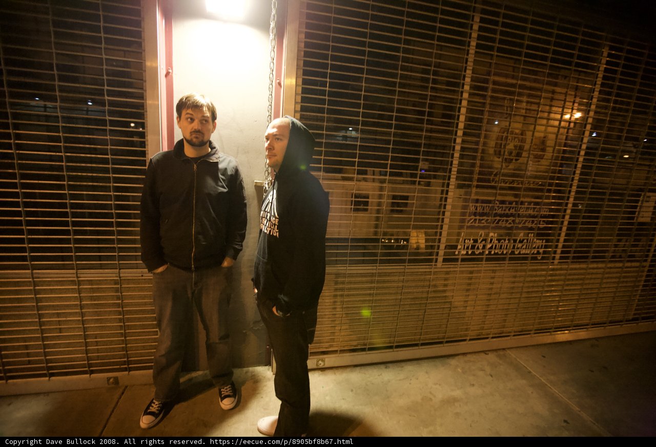 Two Men Waiting Outside