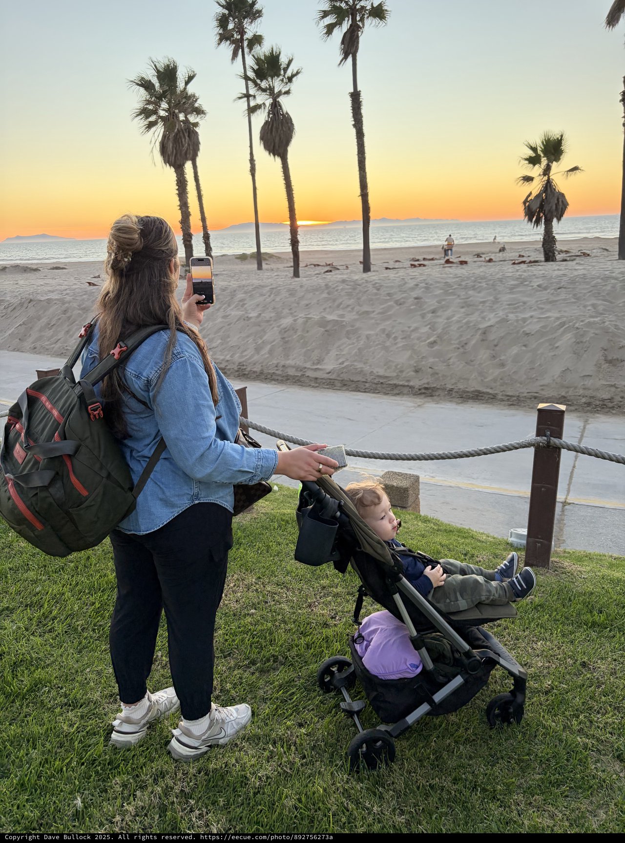 Golden Hour Beach Moment with Mom and Child