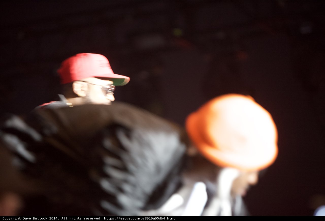 Red-Hatted Men on Stage