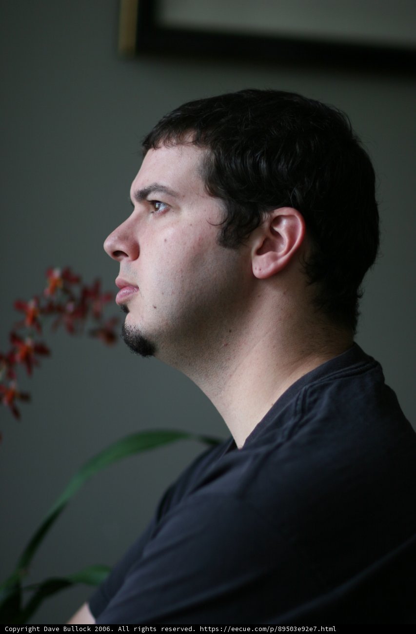 A Man Lost in Thought Among Blooms