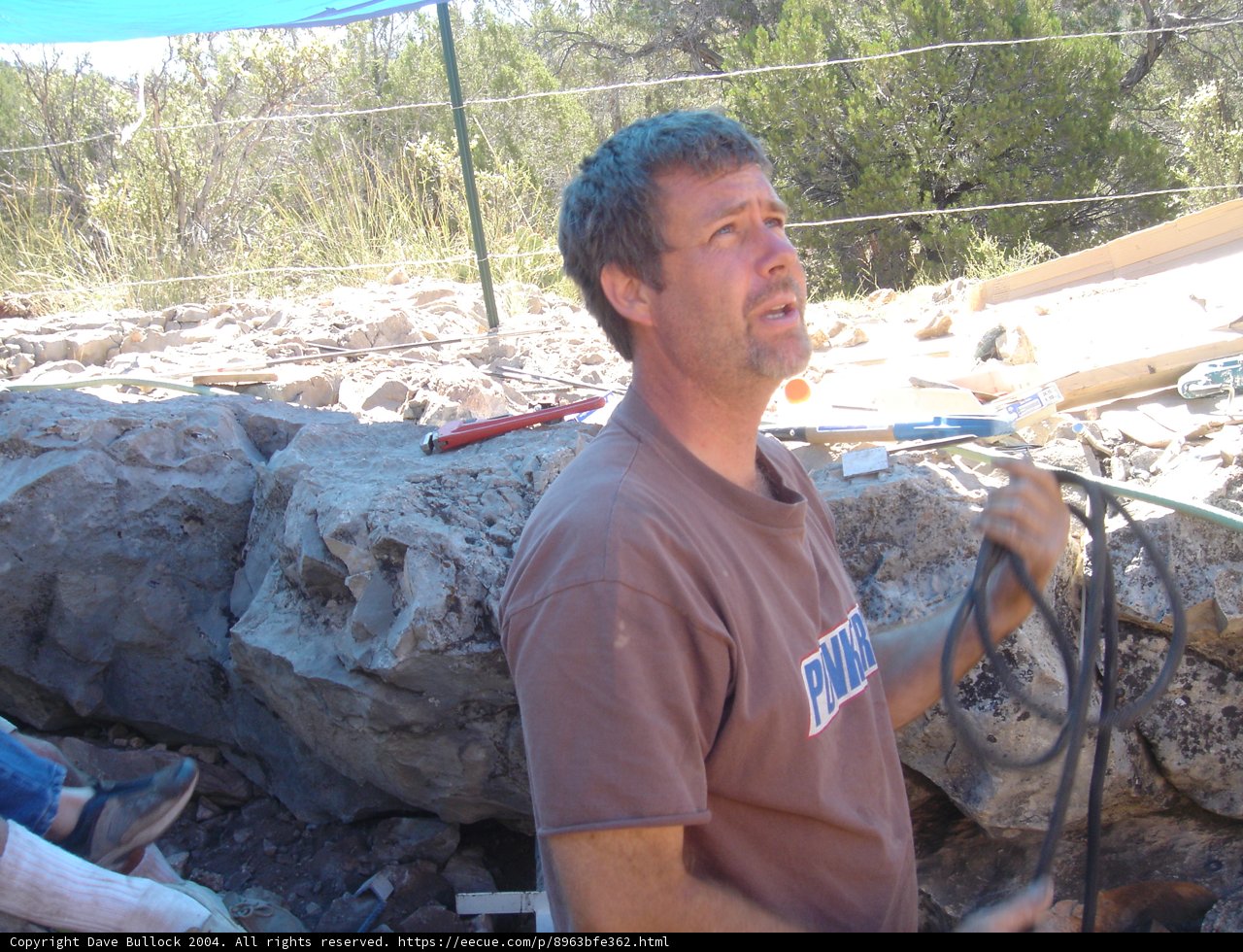 Man in Front of Slate Wall