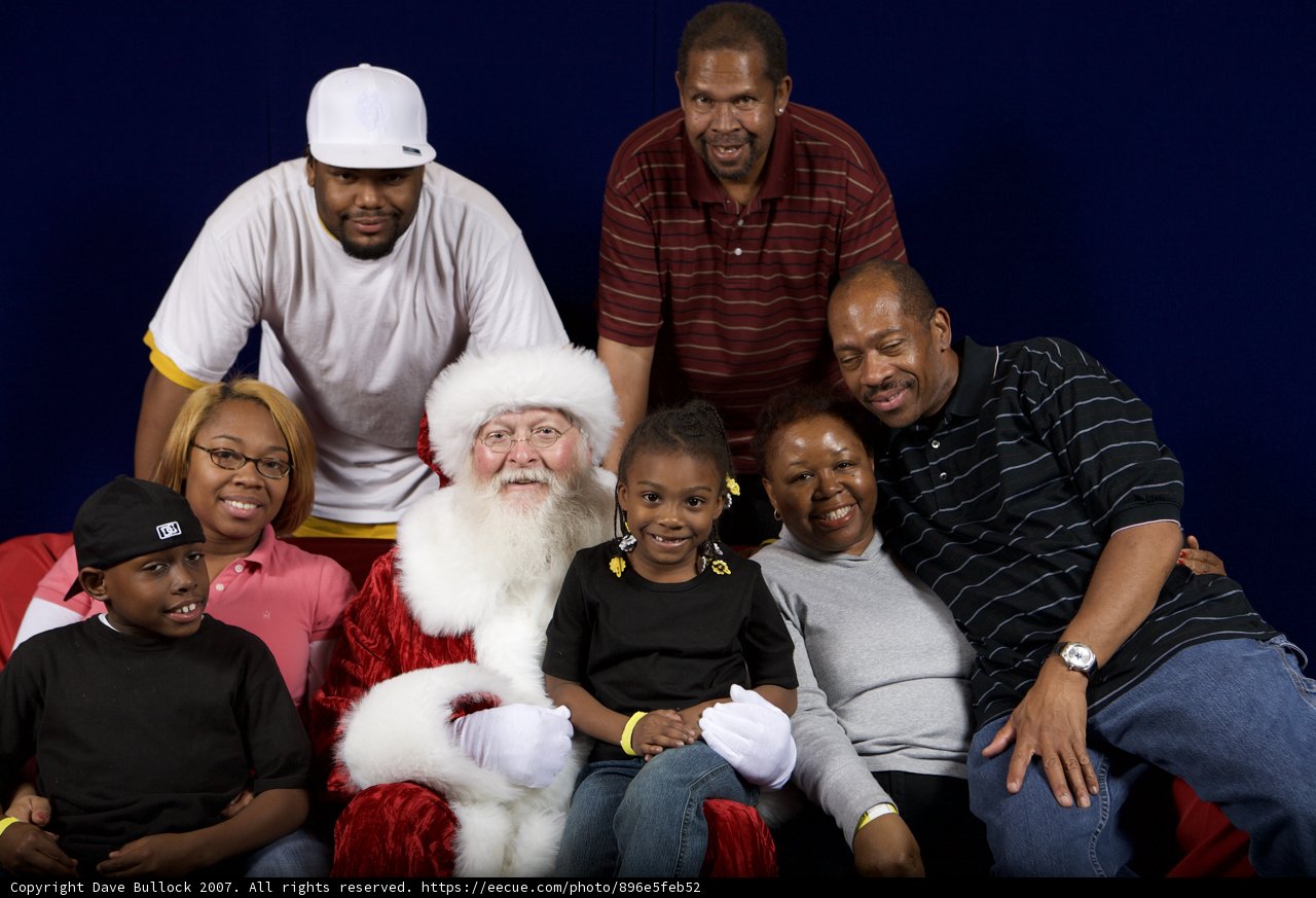 A Festive Family Portrait with Santa Claus