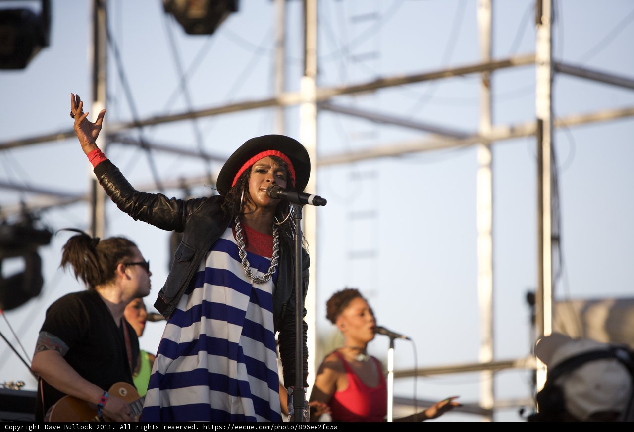 Lauryn Hill Rocks the Crowd with a Striped Dress and Hat