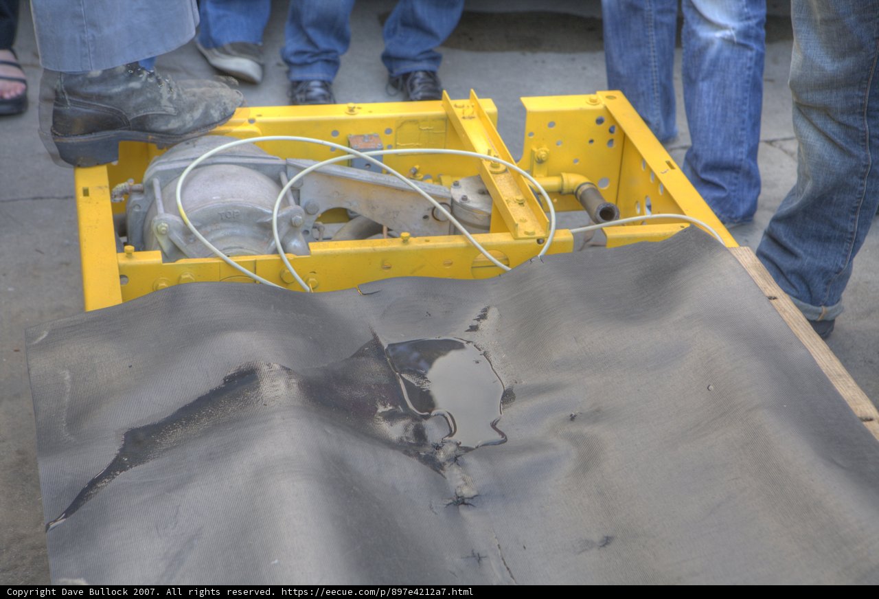 Yellow object attracts attention of group in construction site