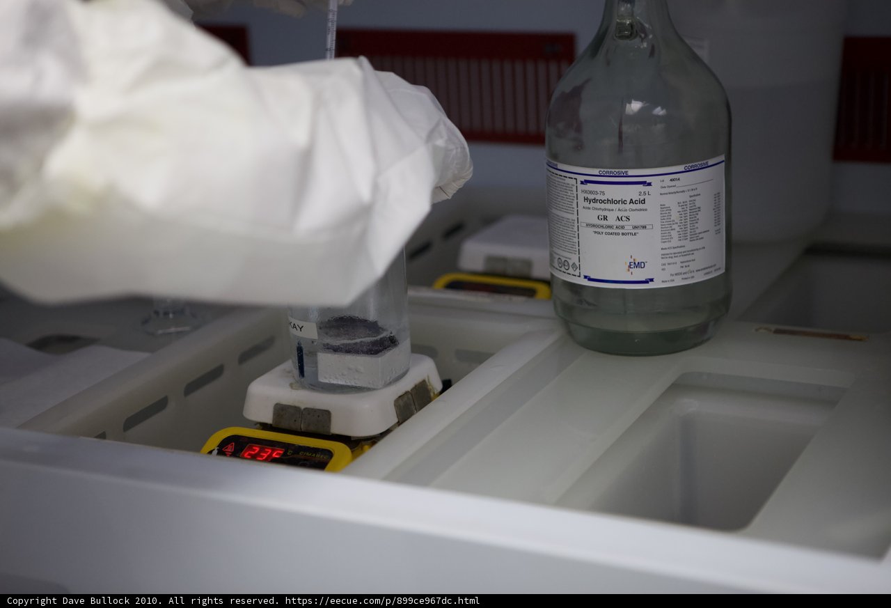 Lab Scientist Holds a Bottle