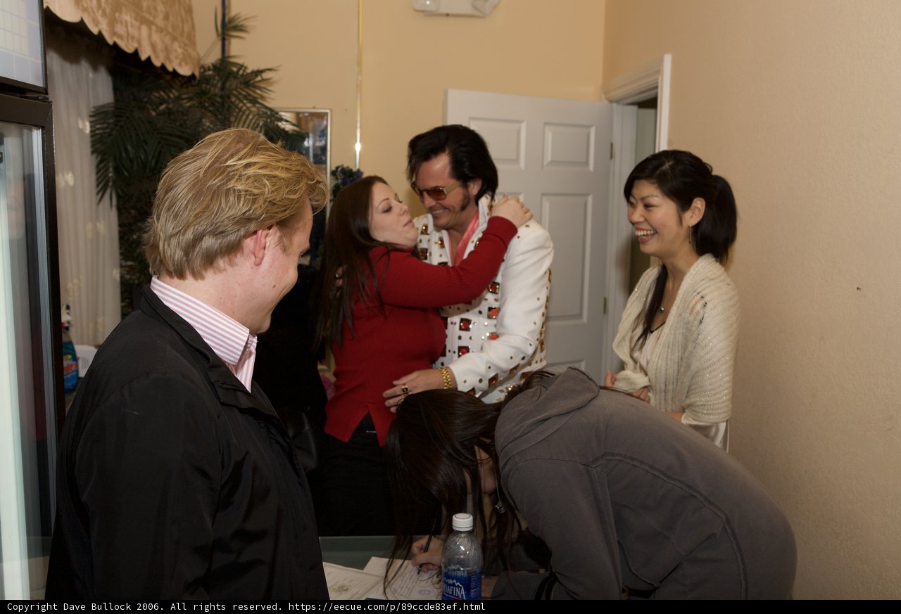 Wedding Guests Surround the Groom