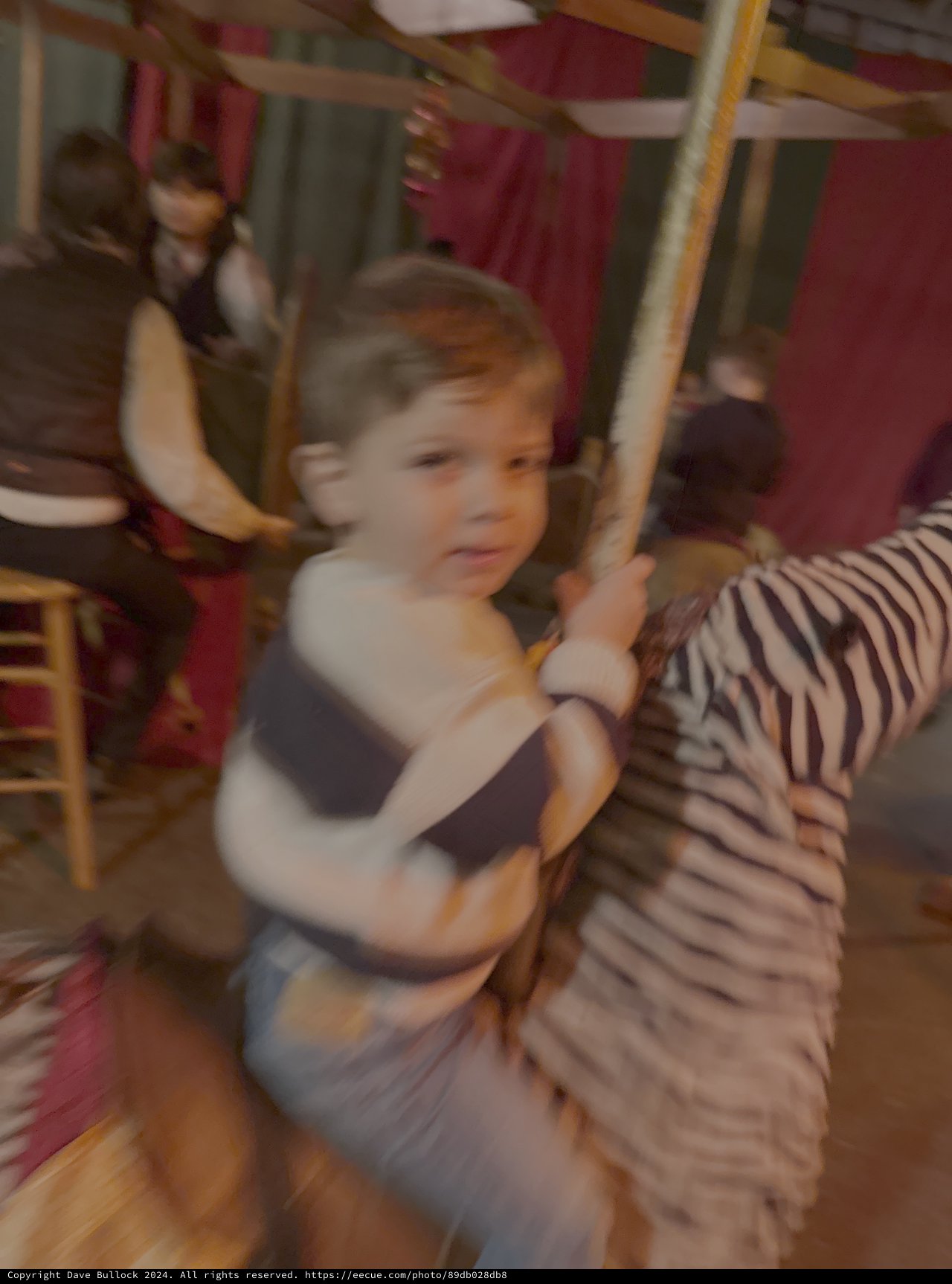Children Playing on Spinning Playground Equipment