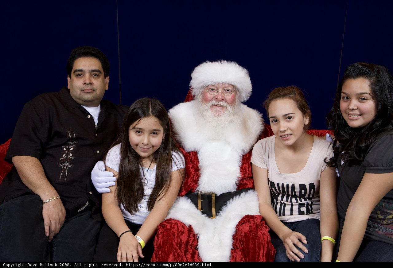 A Festive Family Portrait with Santa