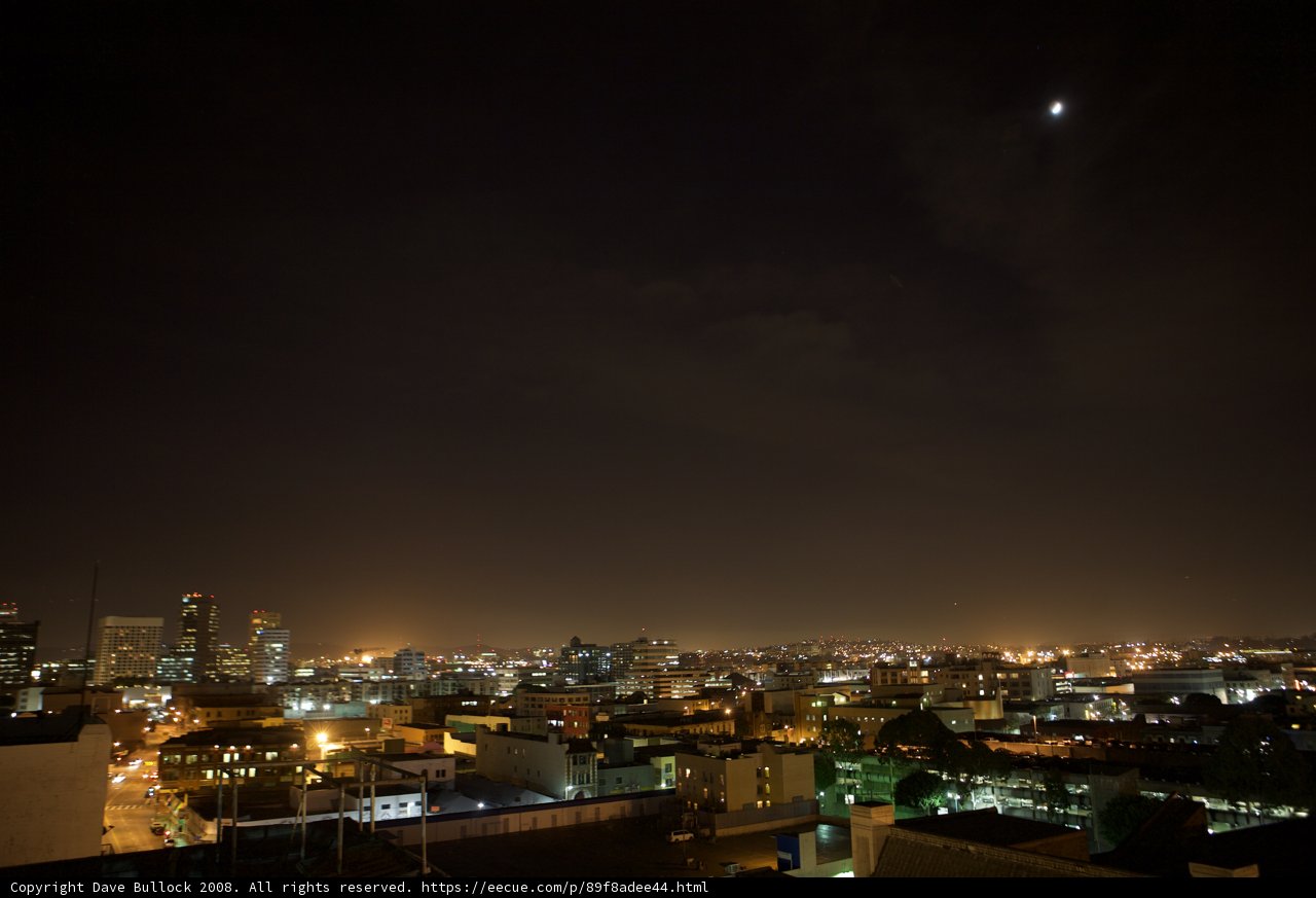 Lunar Eclipse Over the Cityscape