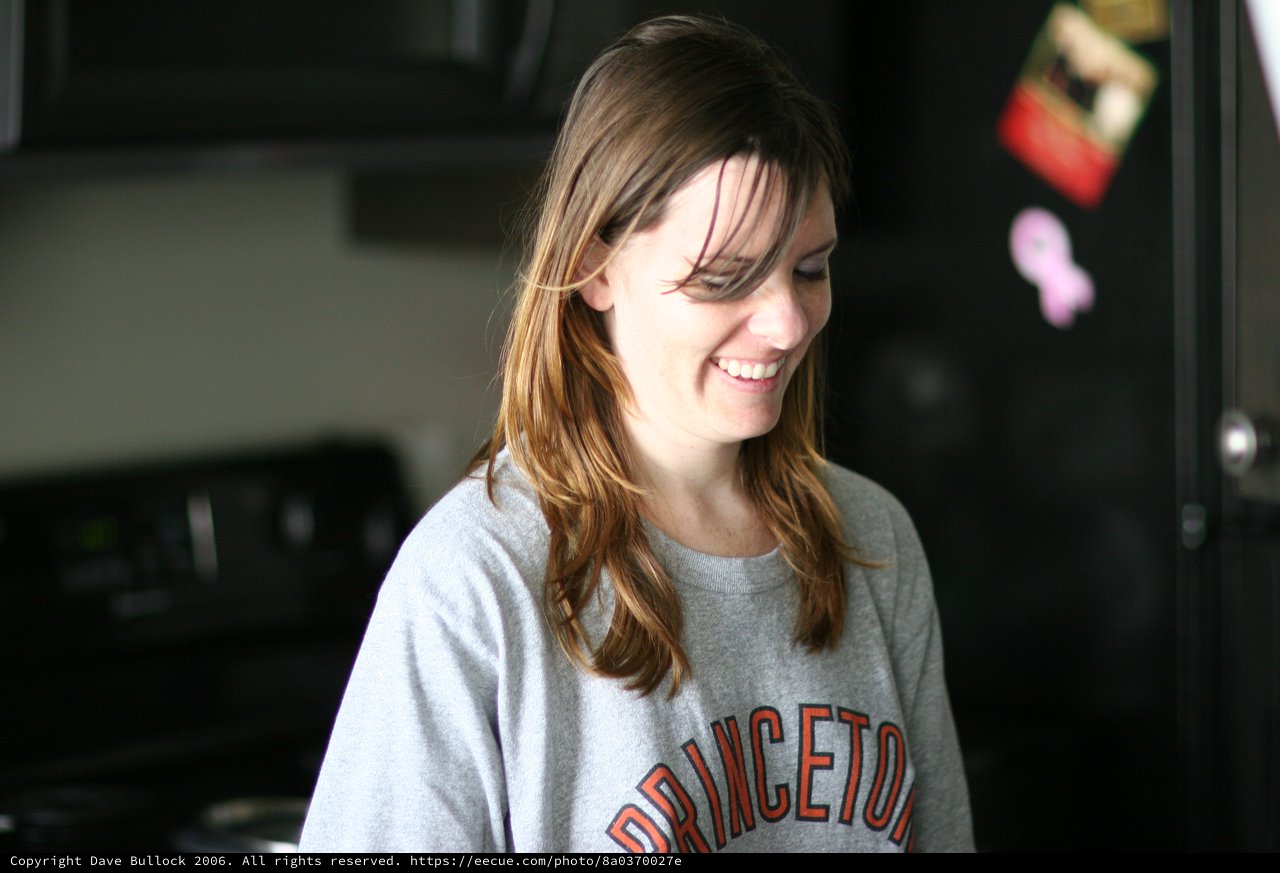 Smiling Woman in Princeton Sweatshirt at Home