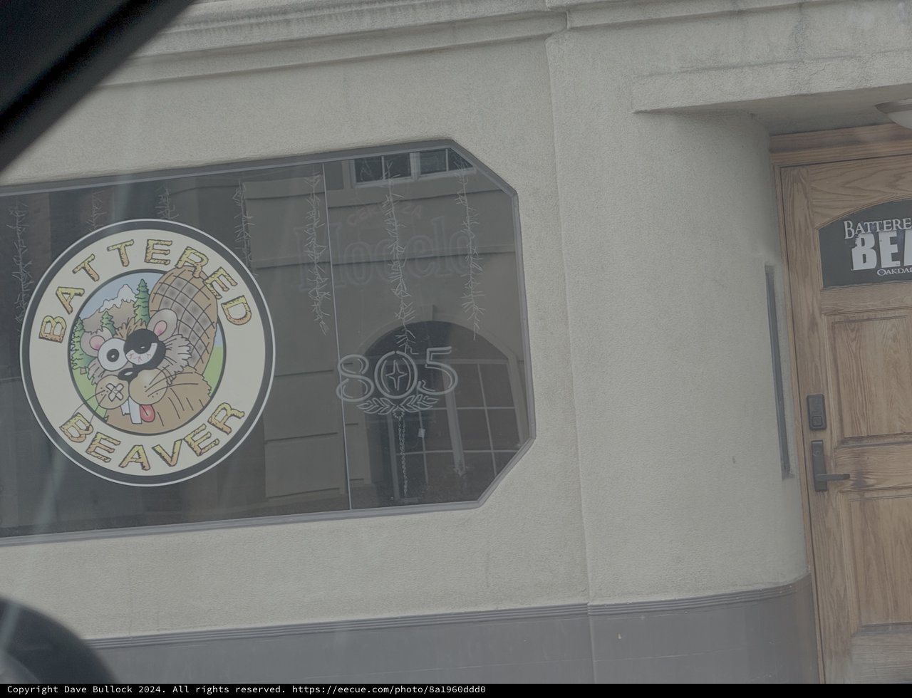 Battered Beaver Restaurant Storefront Through Window