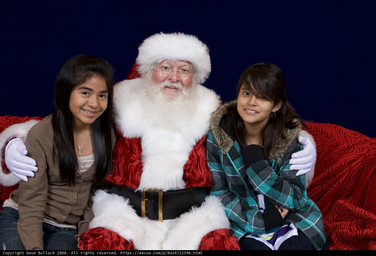 Santa Claus and Two Girls at the APC Xmas Party