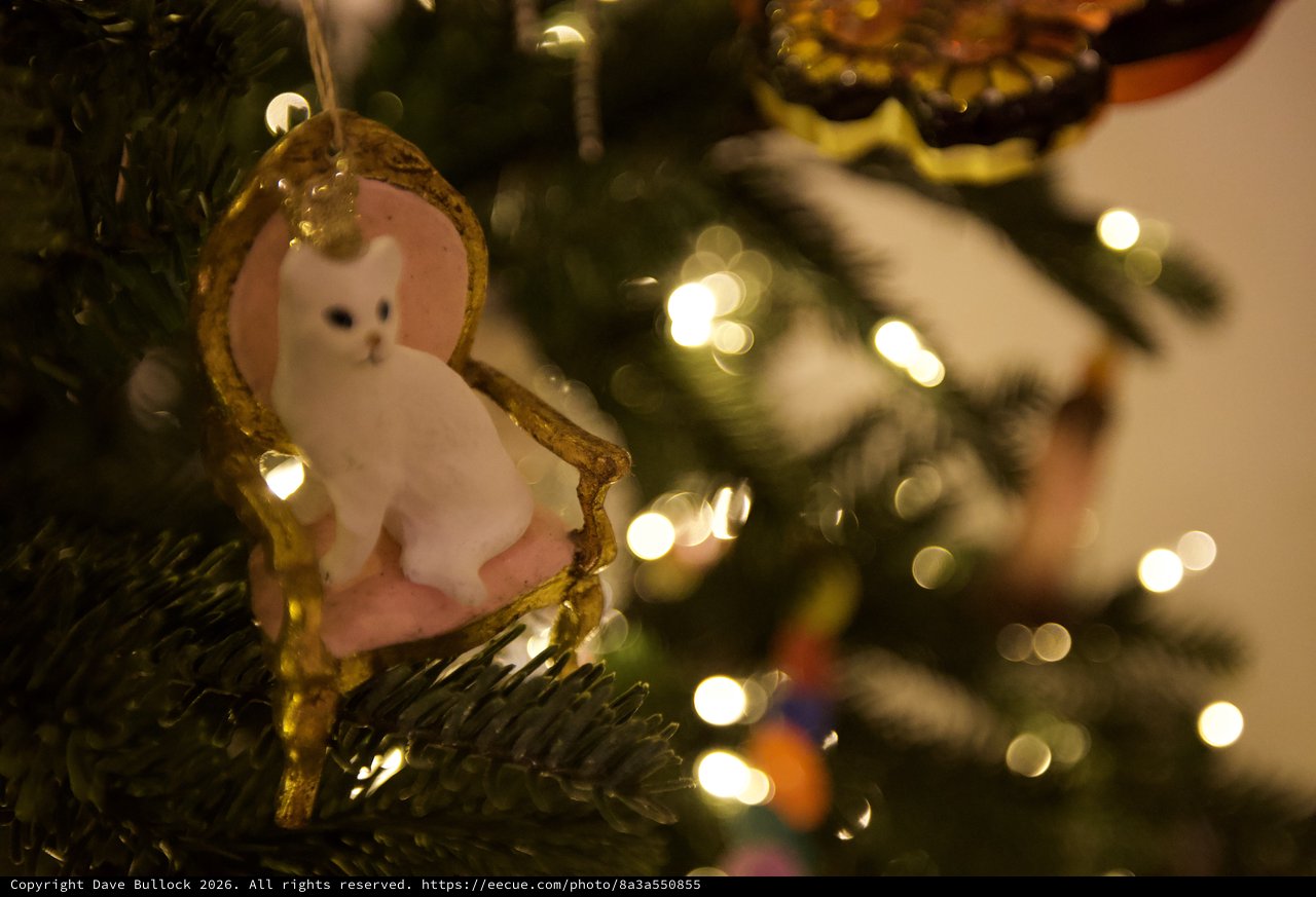 White Cat Christmas Ornament on Illuminated Tree