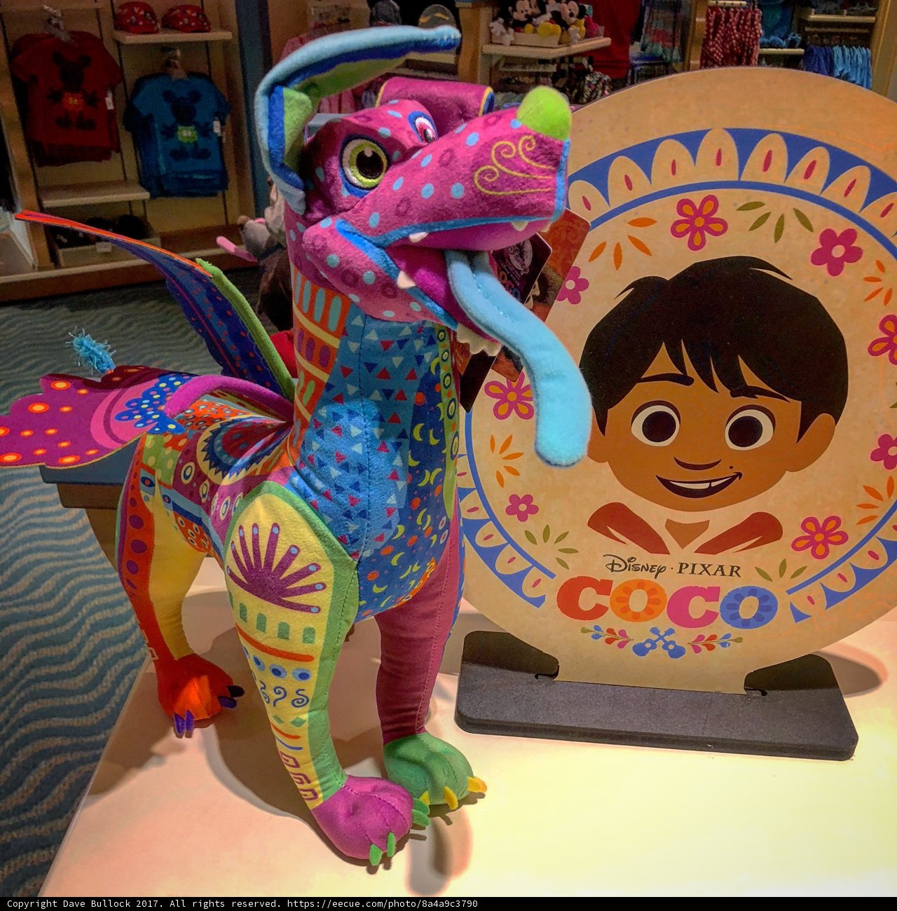 Colorful Stuffed Dragon with Cute Kid Picture
