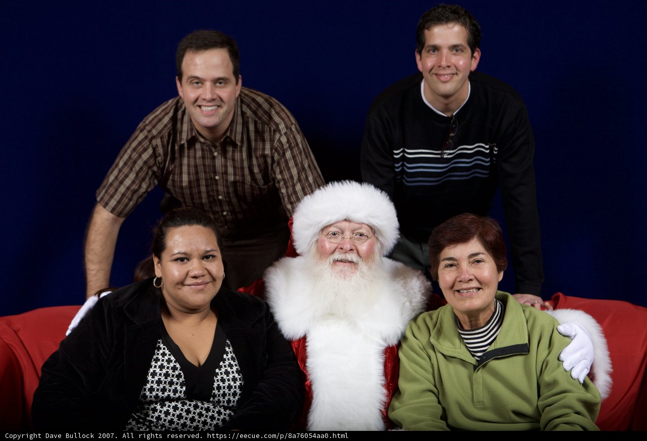 A Family's Festive Photo with Santa