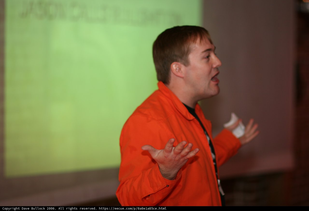 Man in Orange Shirt in Barcamp 3