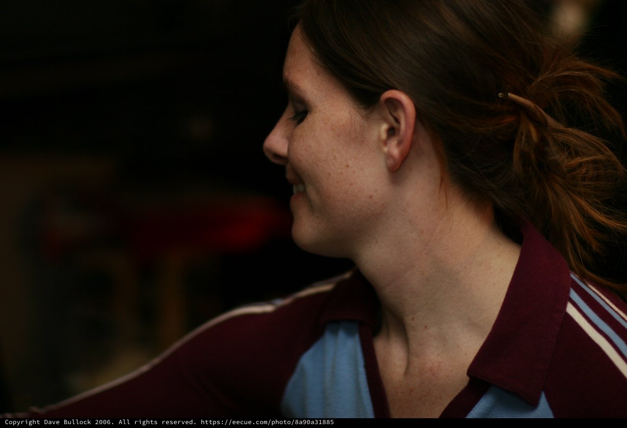 Candid Profile Portrait of a Smiling Woman