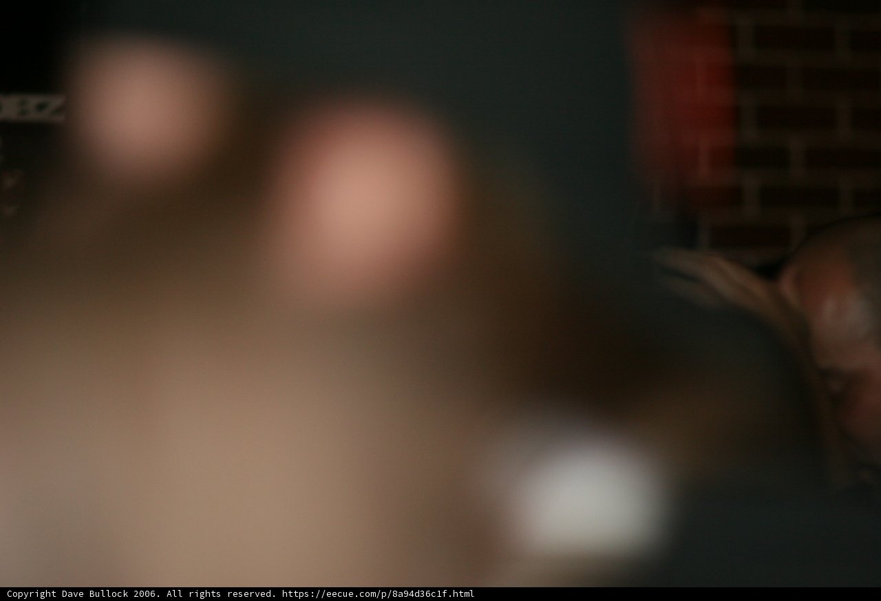 Blurry man in the dark