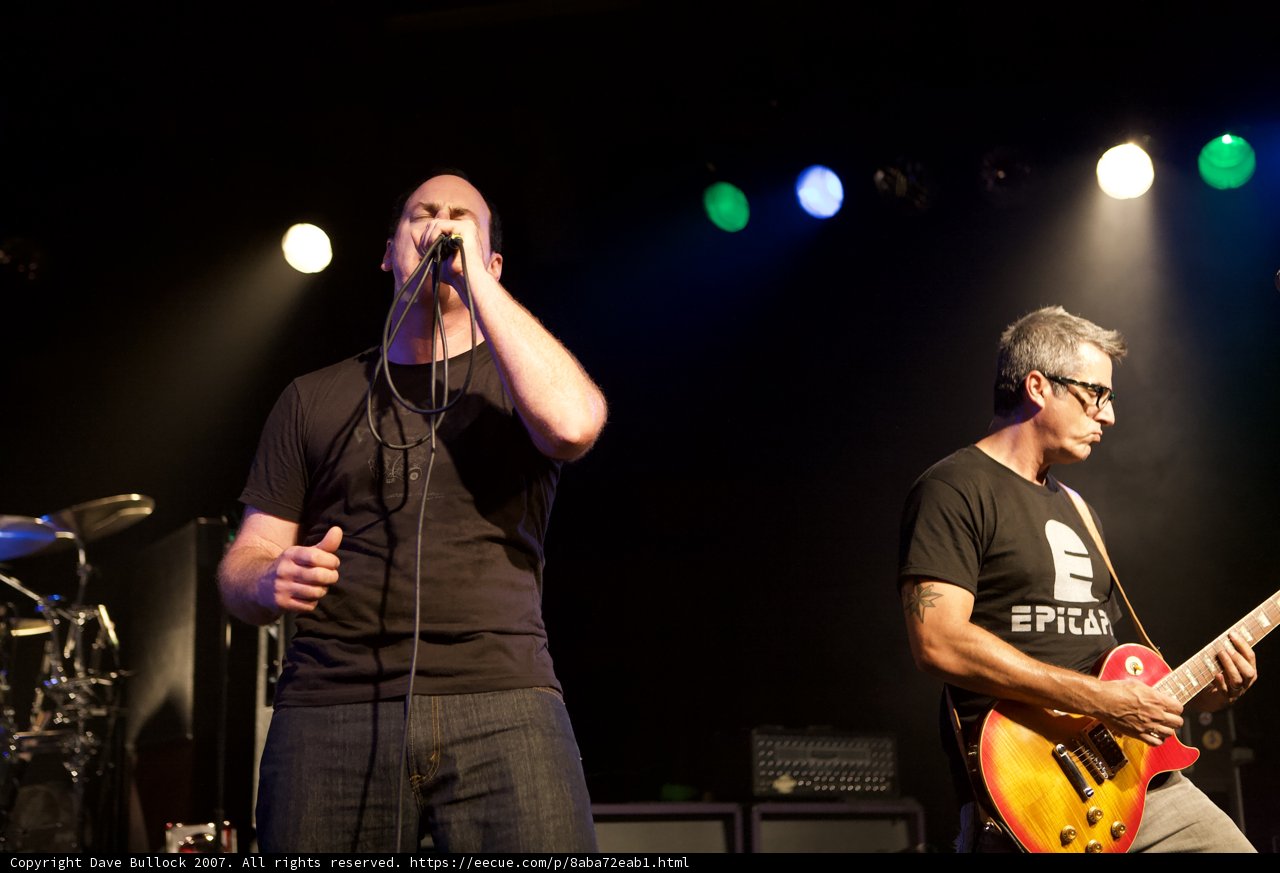 Two Men Rock Out on Stage