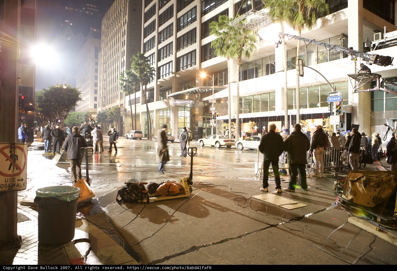 Nighttime Crowd on the Metropolis Sidewalk