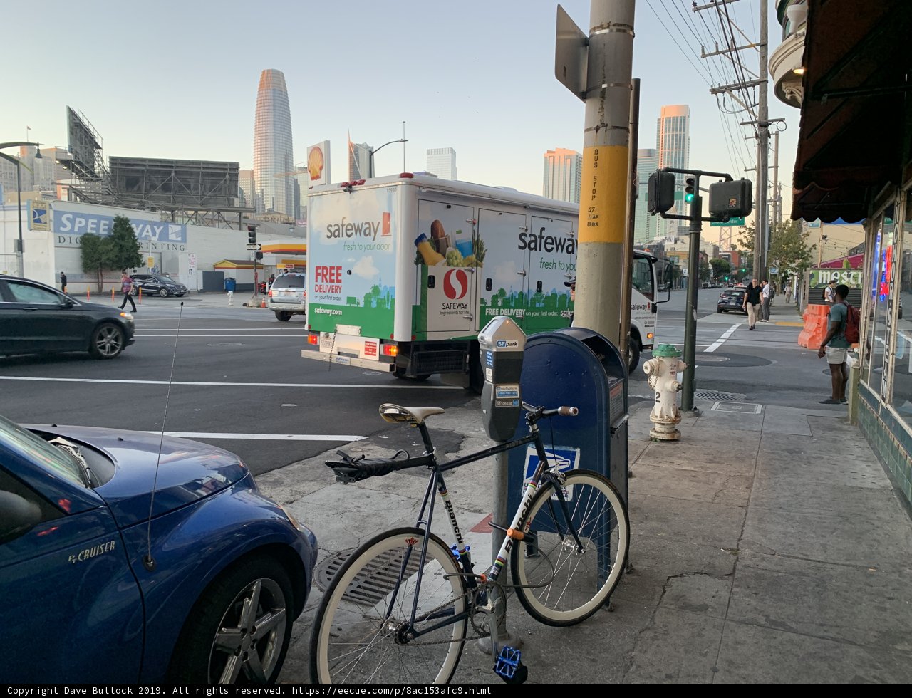 Blue Car Parked on the Busy Streets of San Francisco