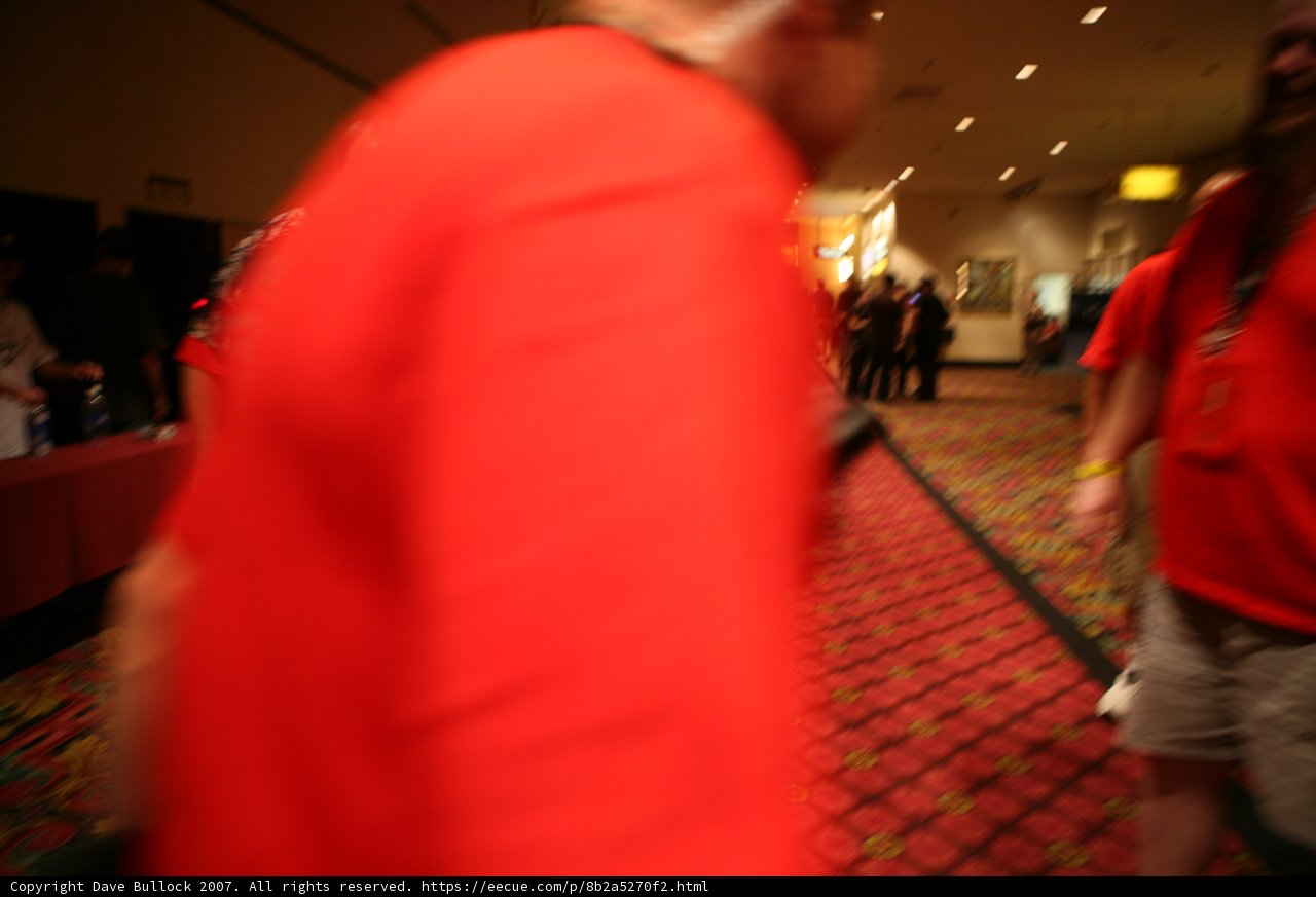 Blurred Man in Red Shirt