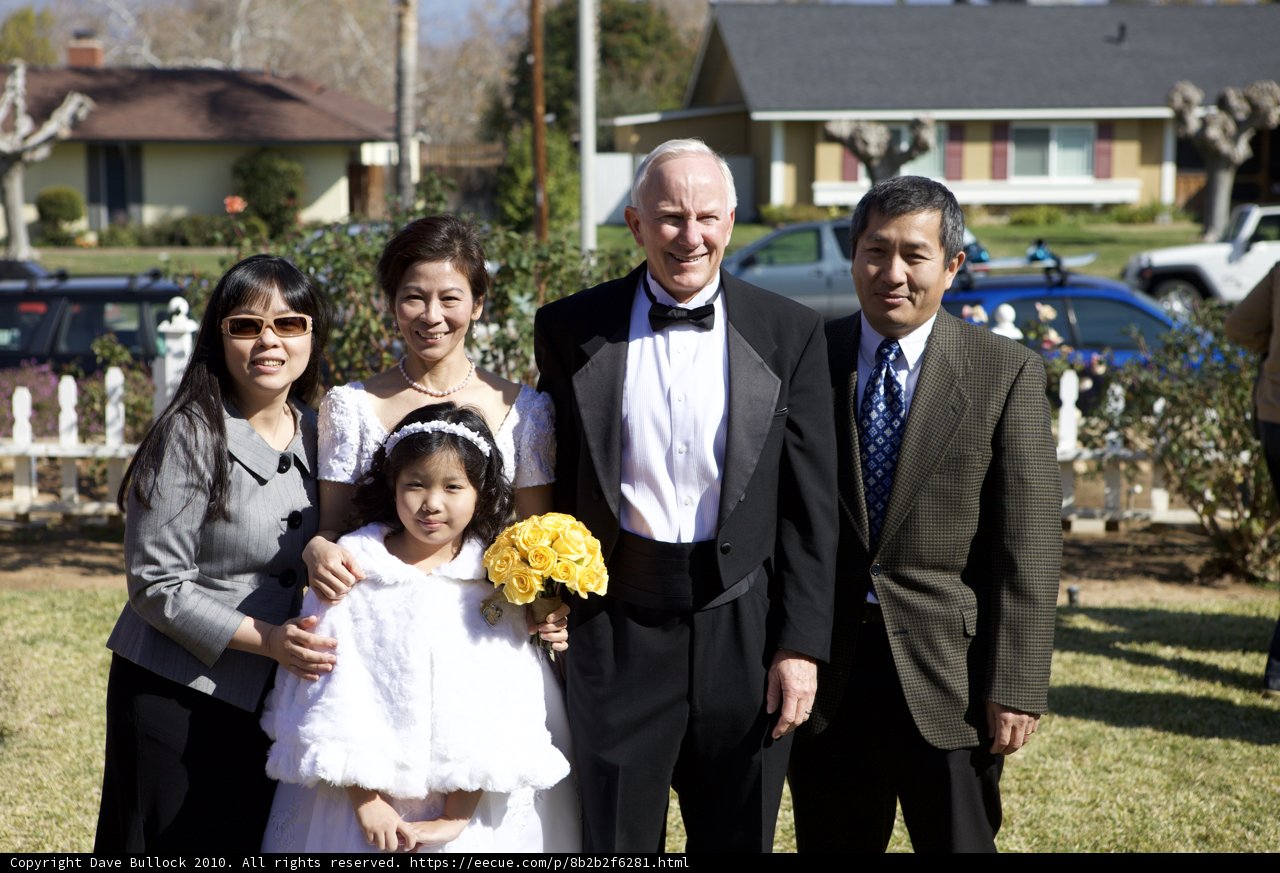 Family Portrait in Front of their Home