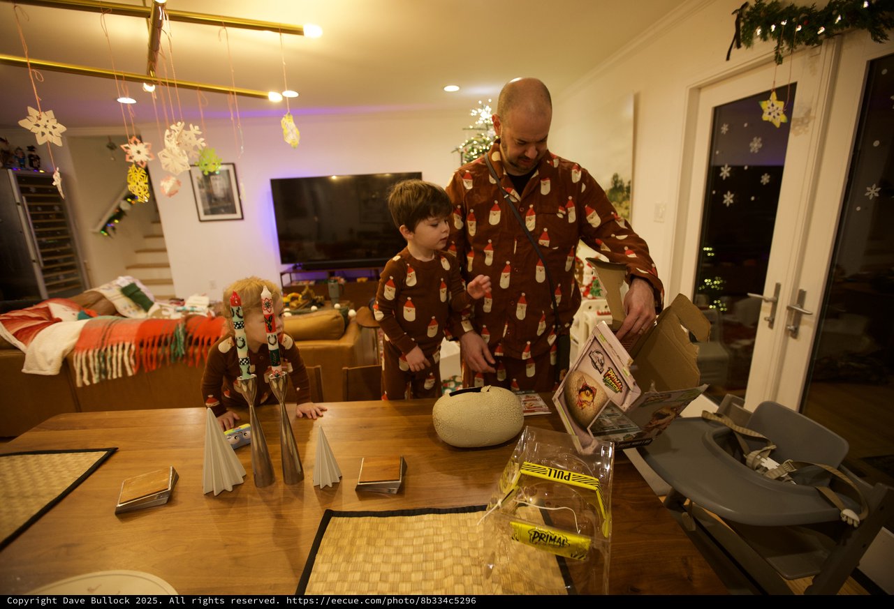 Father and Son in Matching Pajamas on Christmas Morning