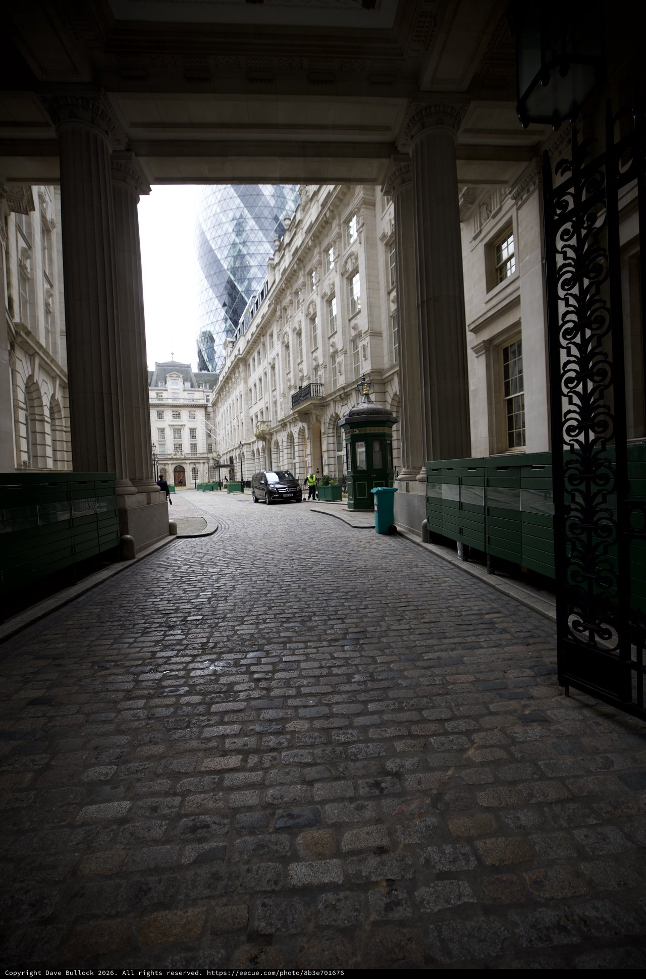 Gateway to London's Financial District Through Classical Archway