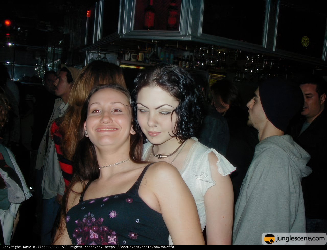 Nightclub Snapshot with Glamorous Ladies