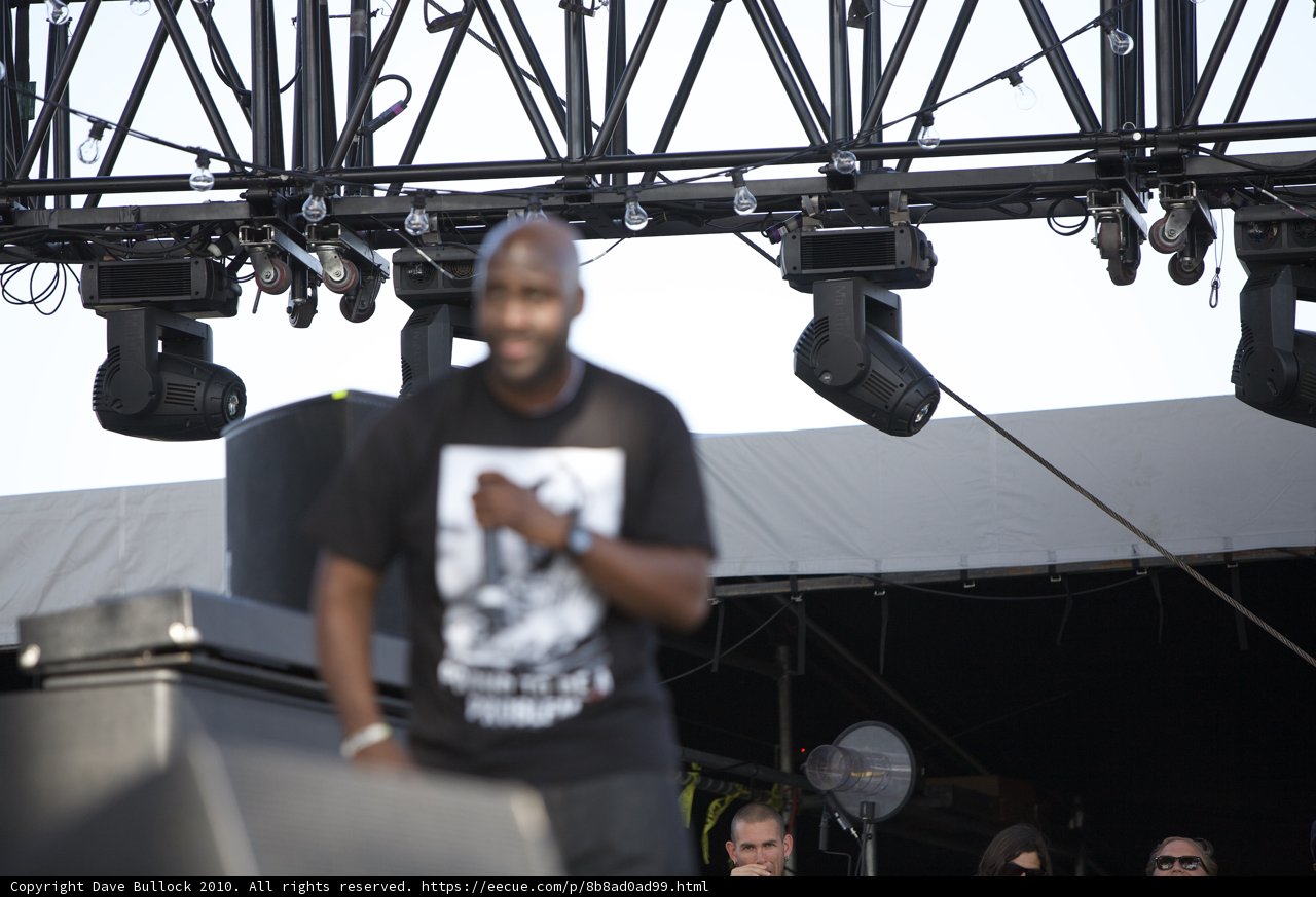 Spotlight on the Man in Black T-Shirt