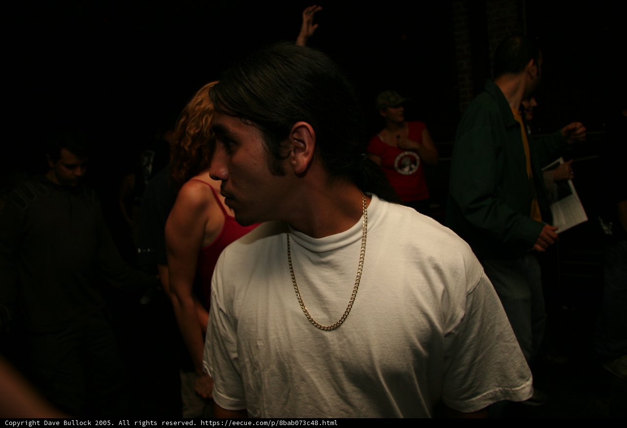 Long-Haired Man in the Urban Night Club