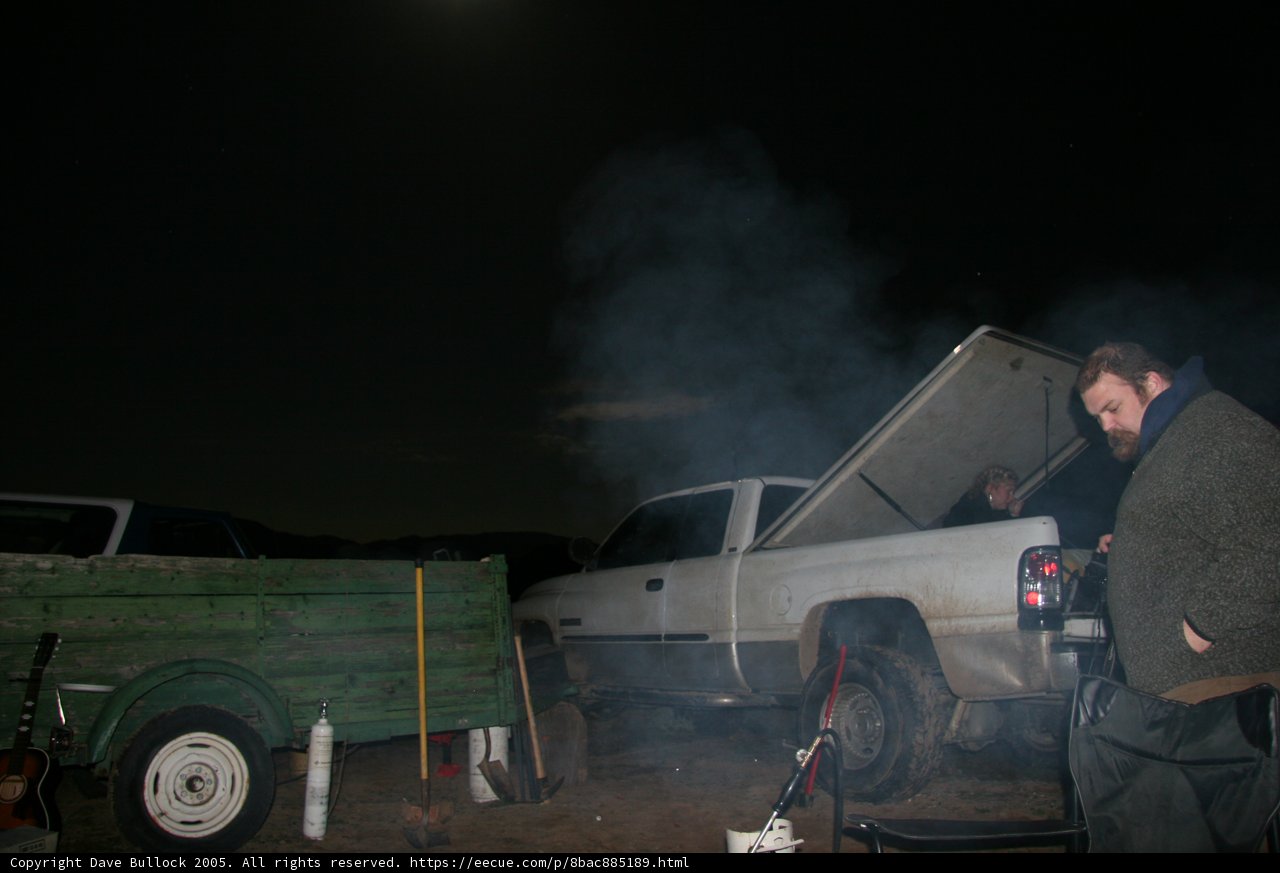 Man and Truck Under the Night Sky