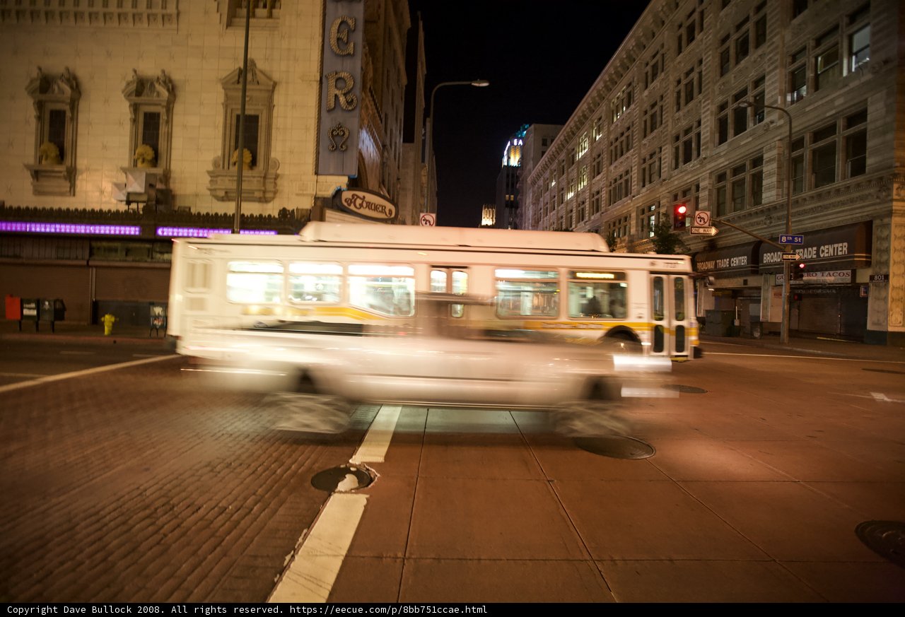 A White Truck Cruising Through the City