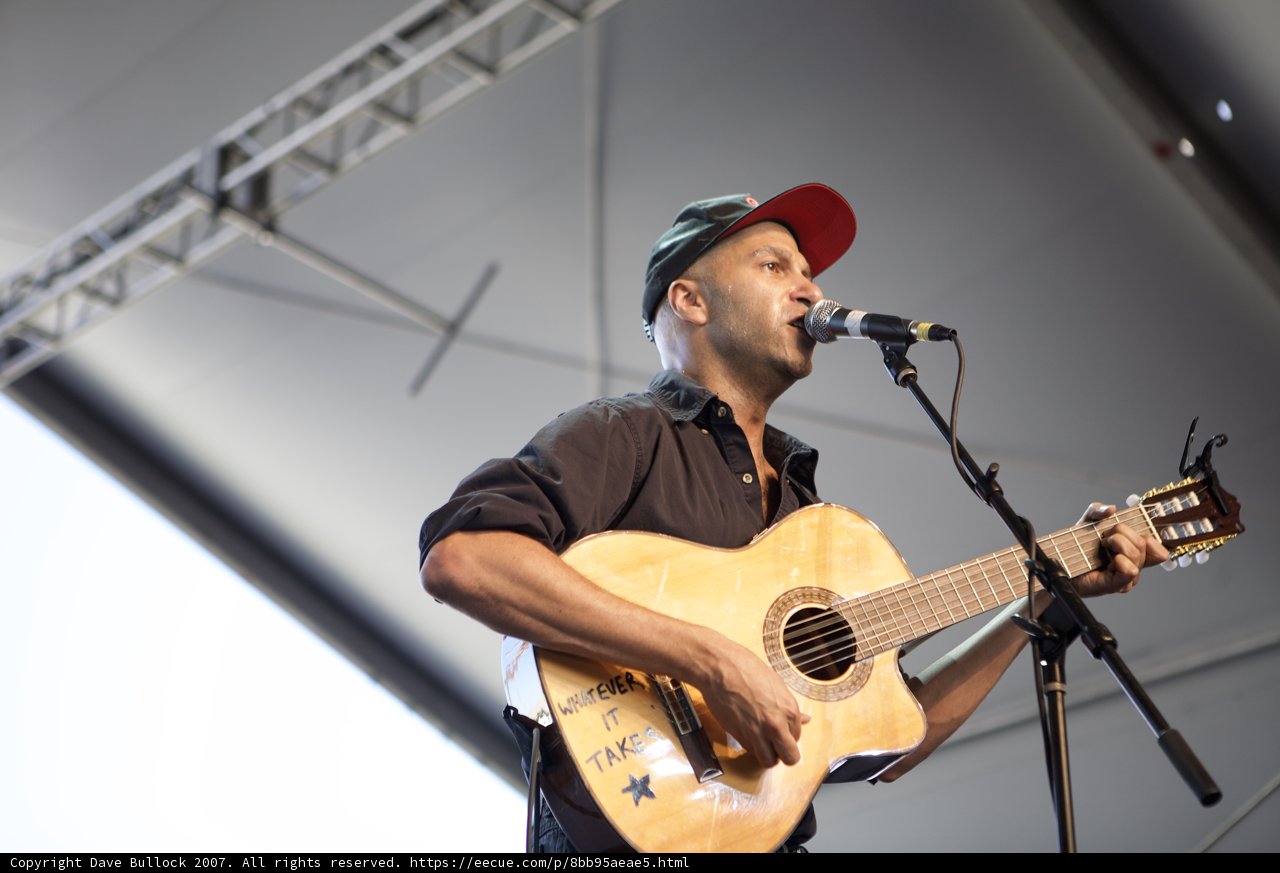 Tom Morello strums his acoustic guitar at Coachella
