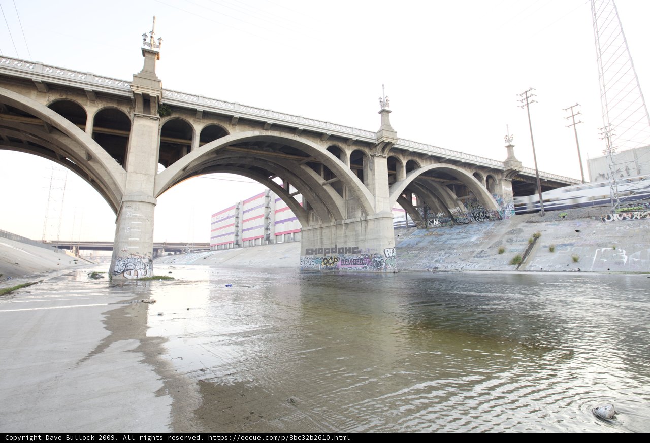 Arch Bridge Over a Busy Waterway