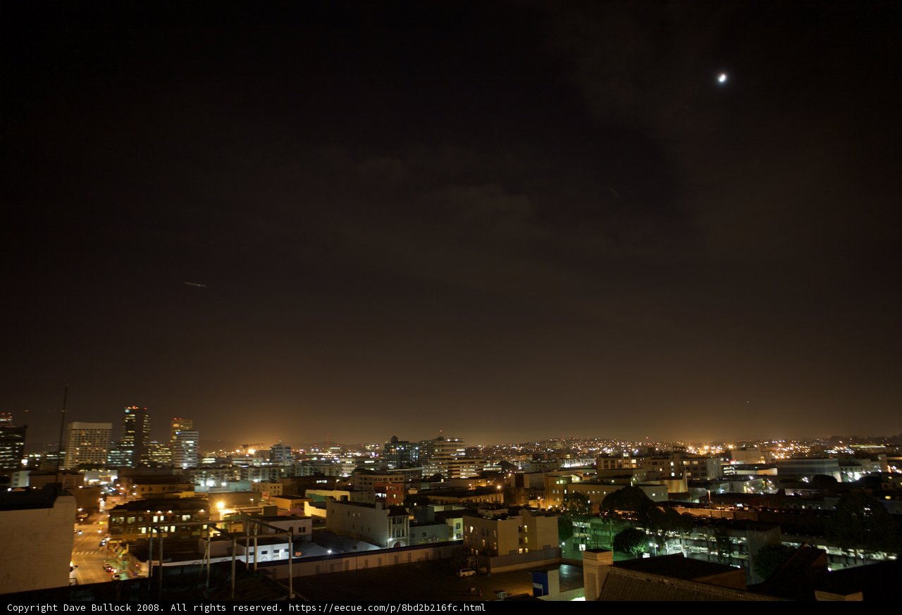 Lunar Eclipse Illuminates Urban Metropolis