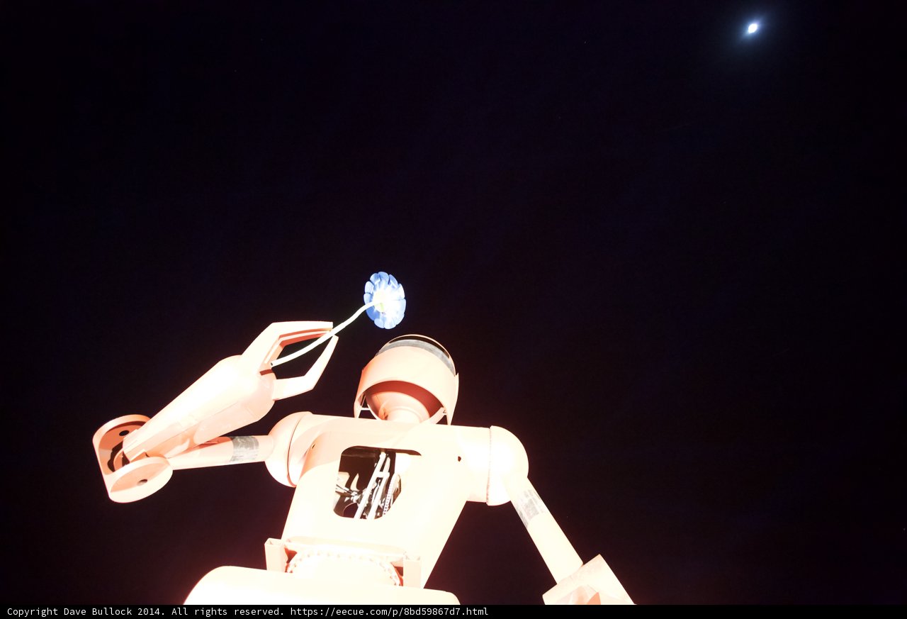 Blue Robot Illuminates the Night