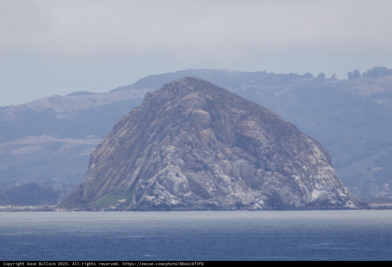 Majestic Morro Rock Amidst Misty Waters