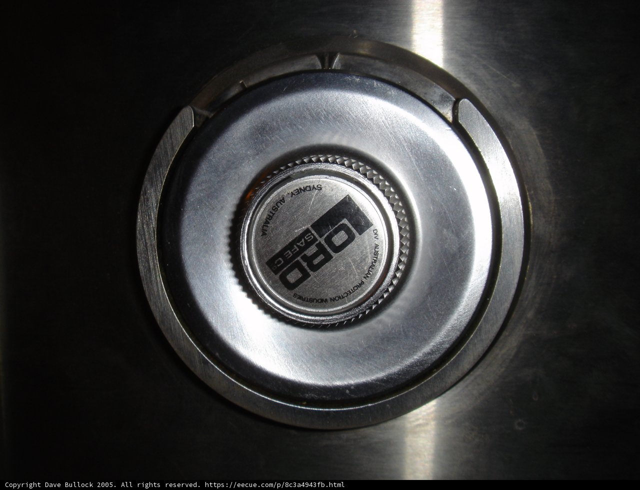 Metal Button Logo on Stove