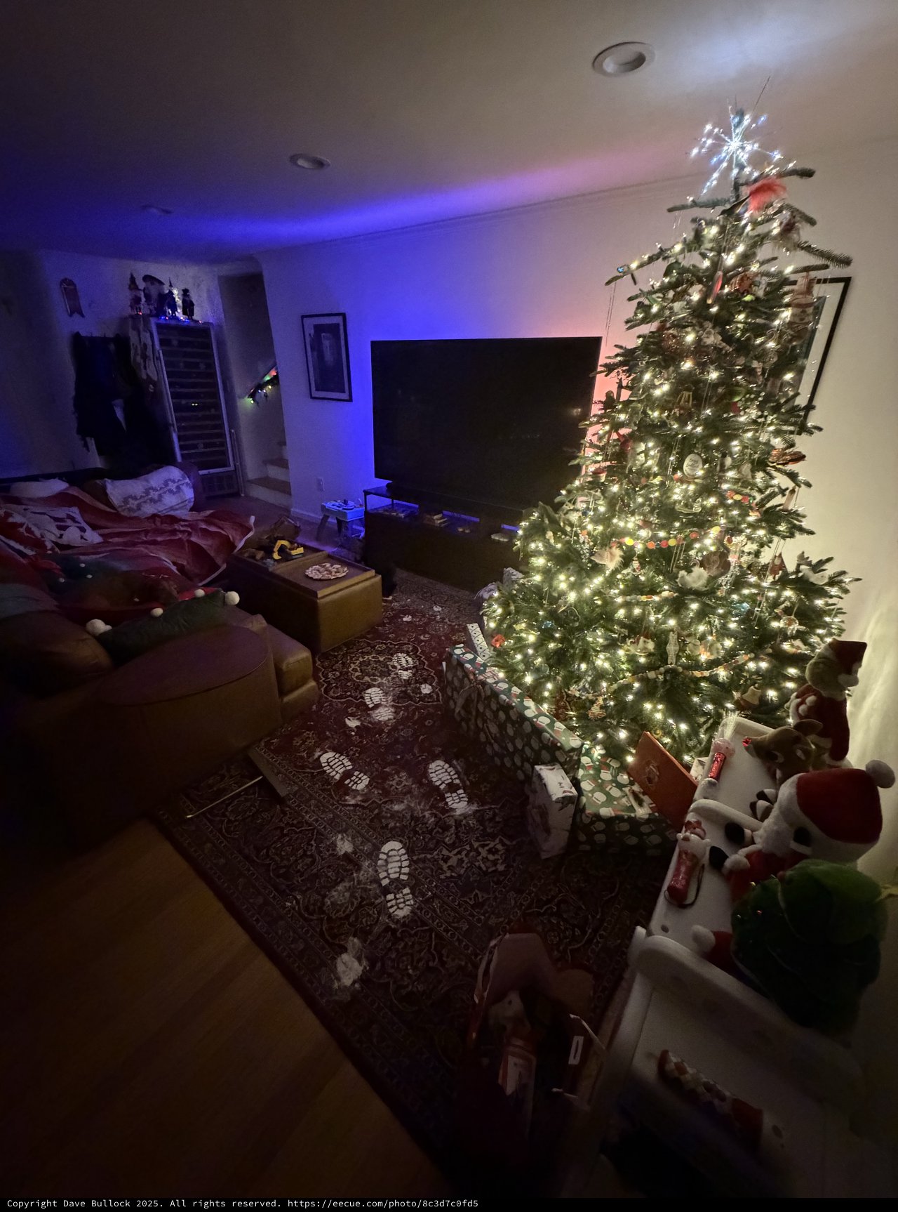 Festive Christmas Morning Living Room with Illuminated Tree