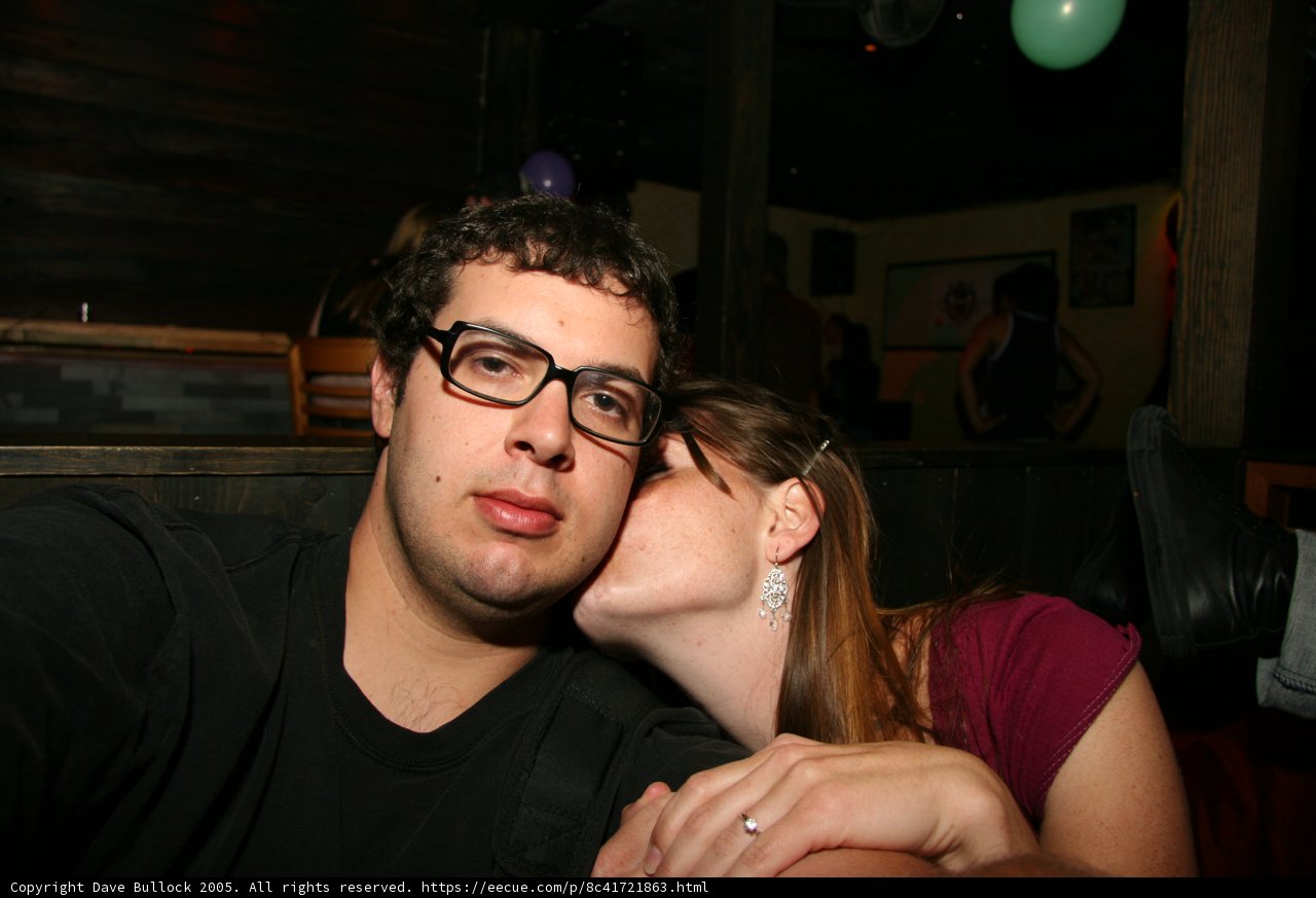 Romantic Kiss at Night Club