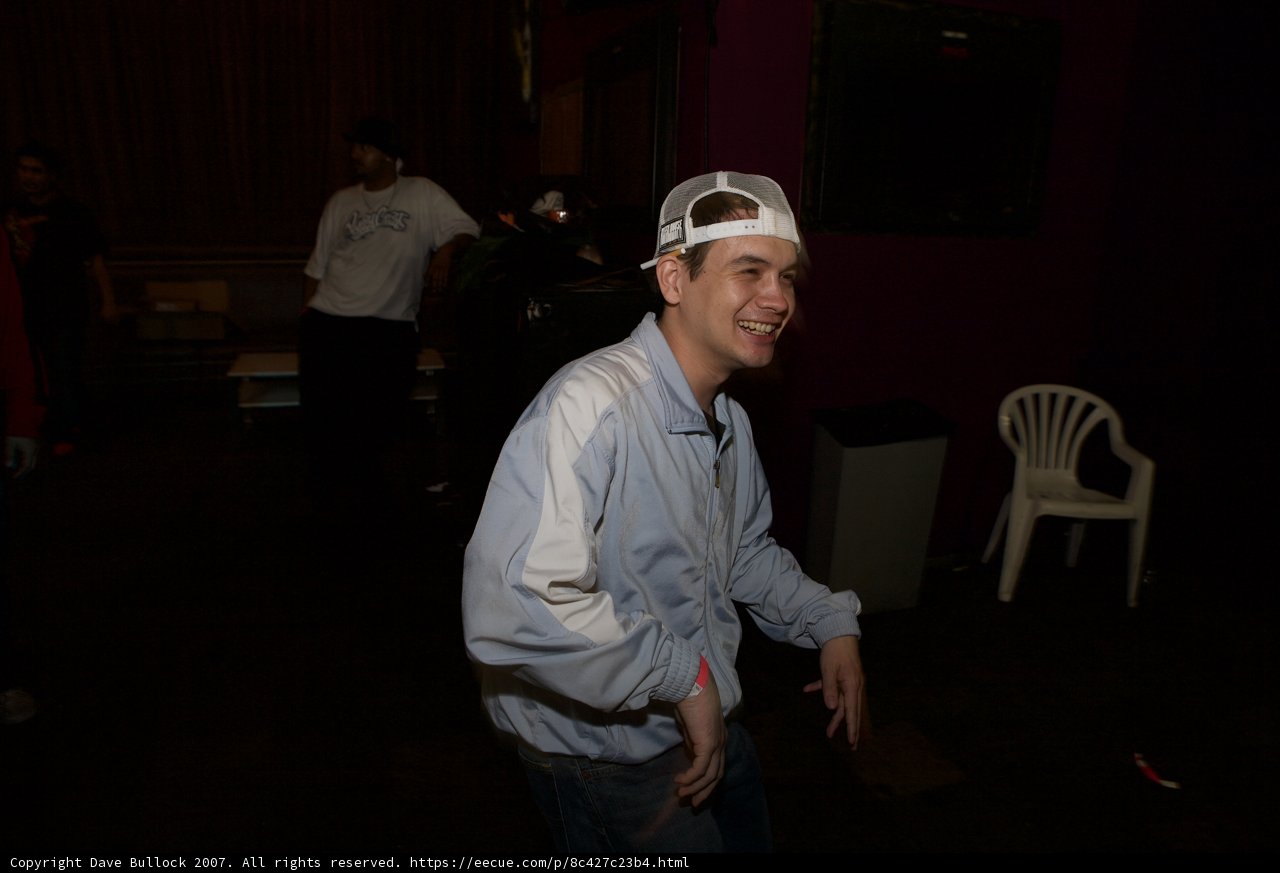 Smiling Bruce in White Hat and Jacket