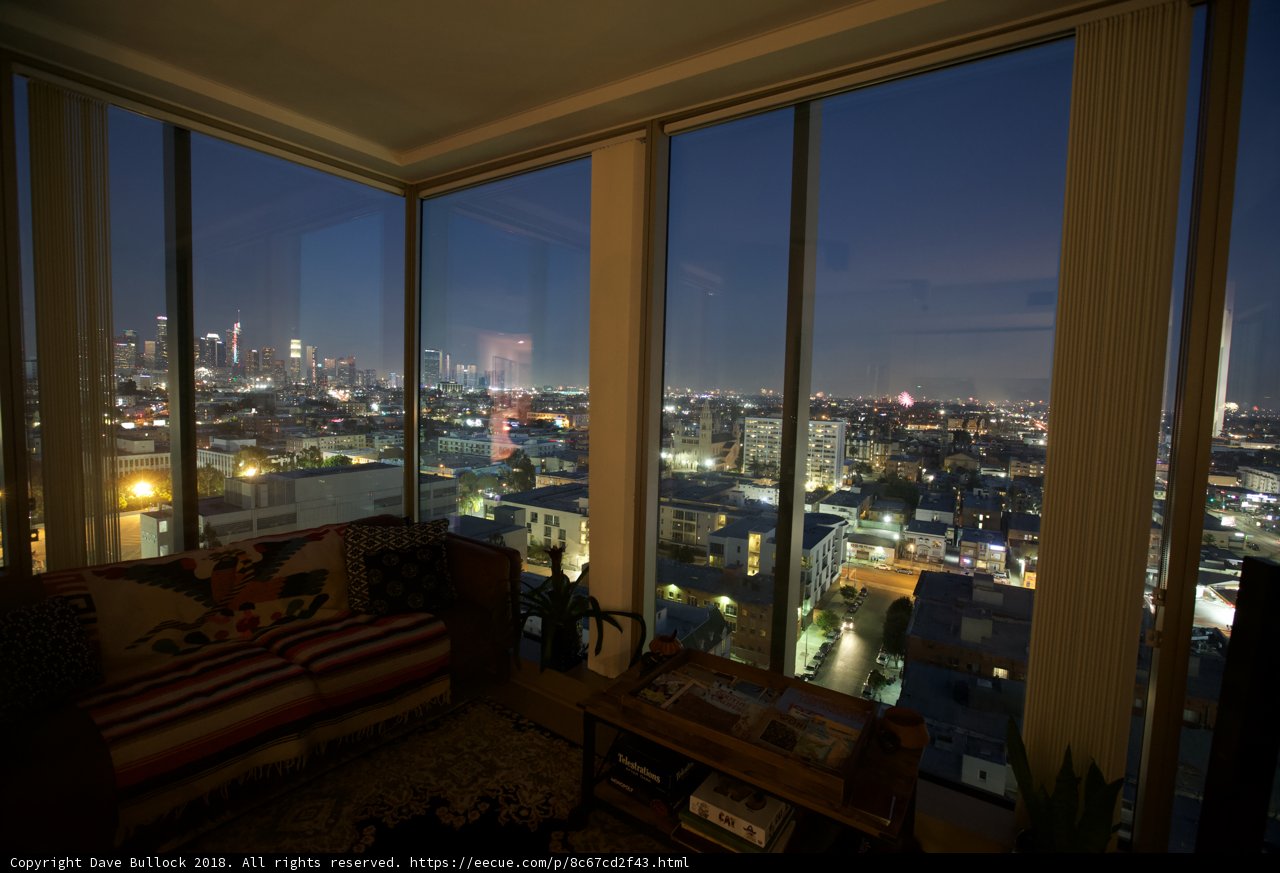 Cityscapes and Sky Views from a Penthouse Living Room
