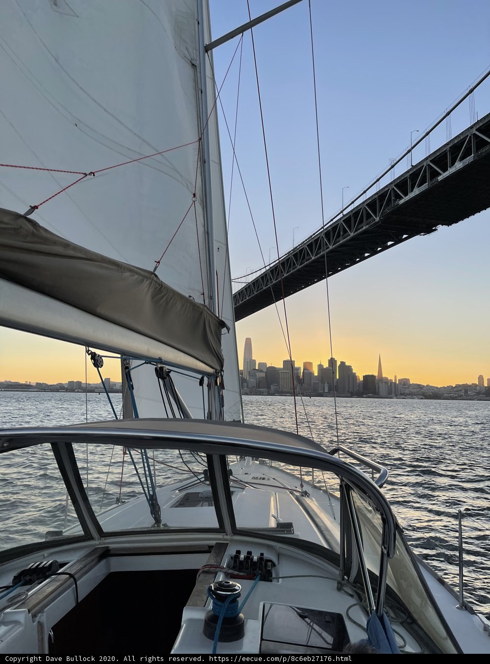 Sailboat Crossing Under the Golden Gate at Sunset