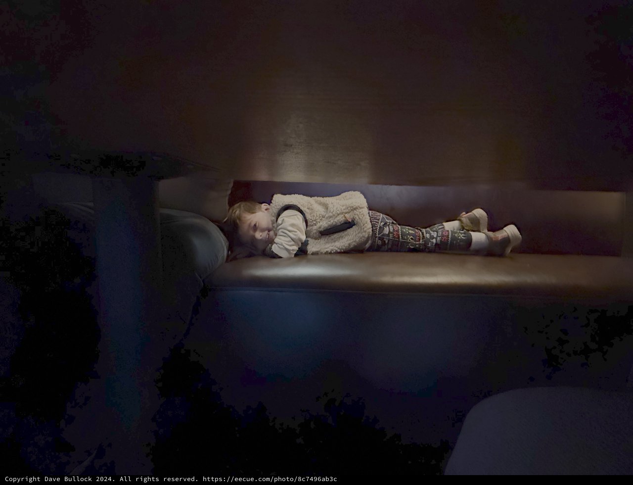 Child Sleeping Peacefully on Living Room Couch