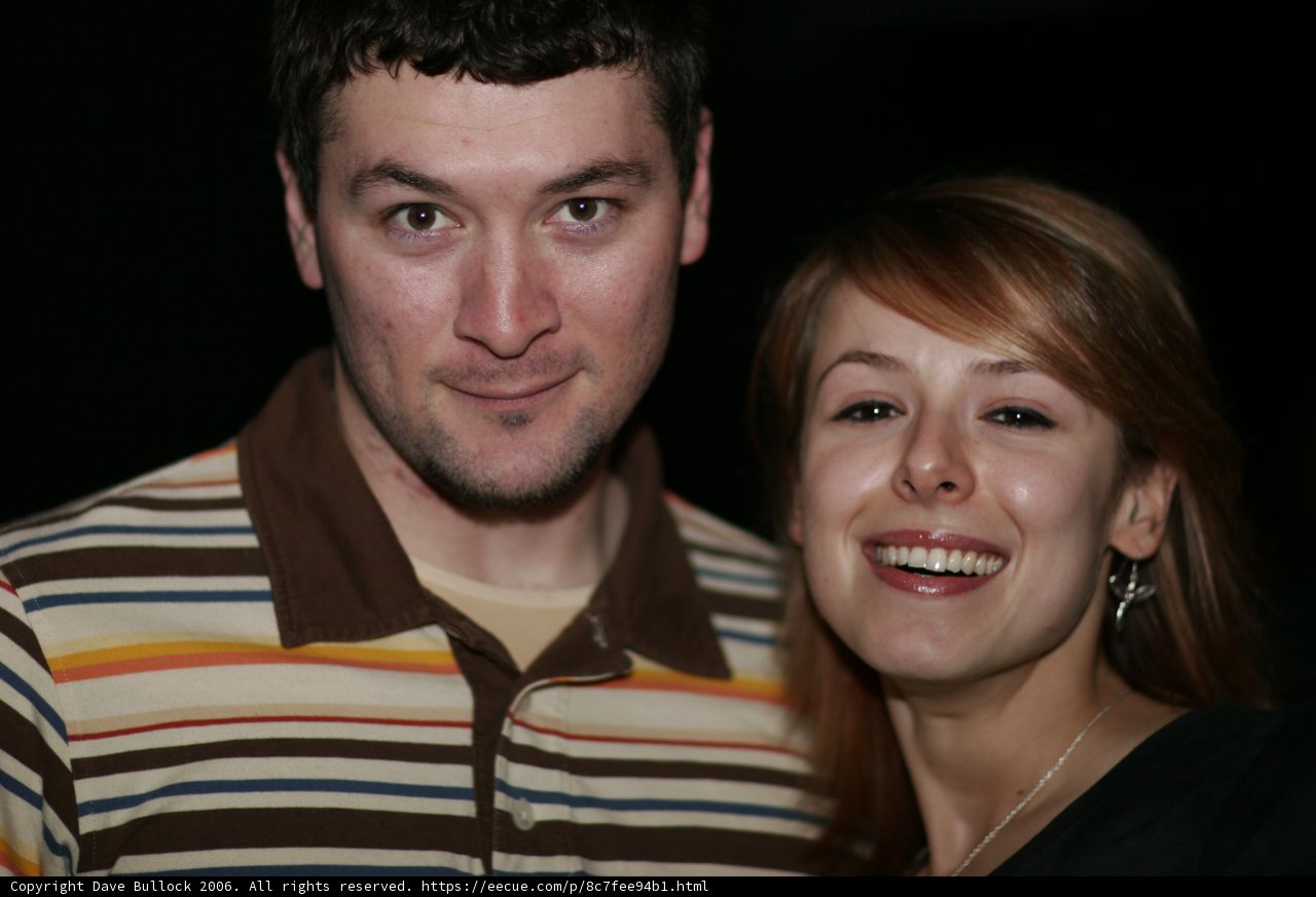 A Happy Couple Posing for a Portrait