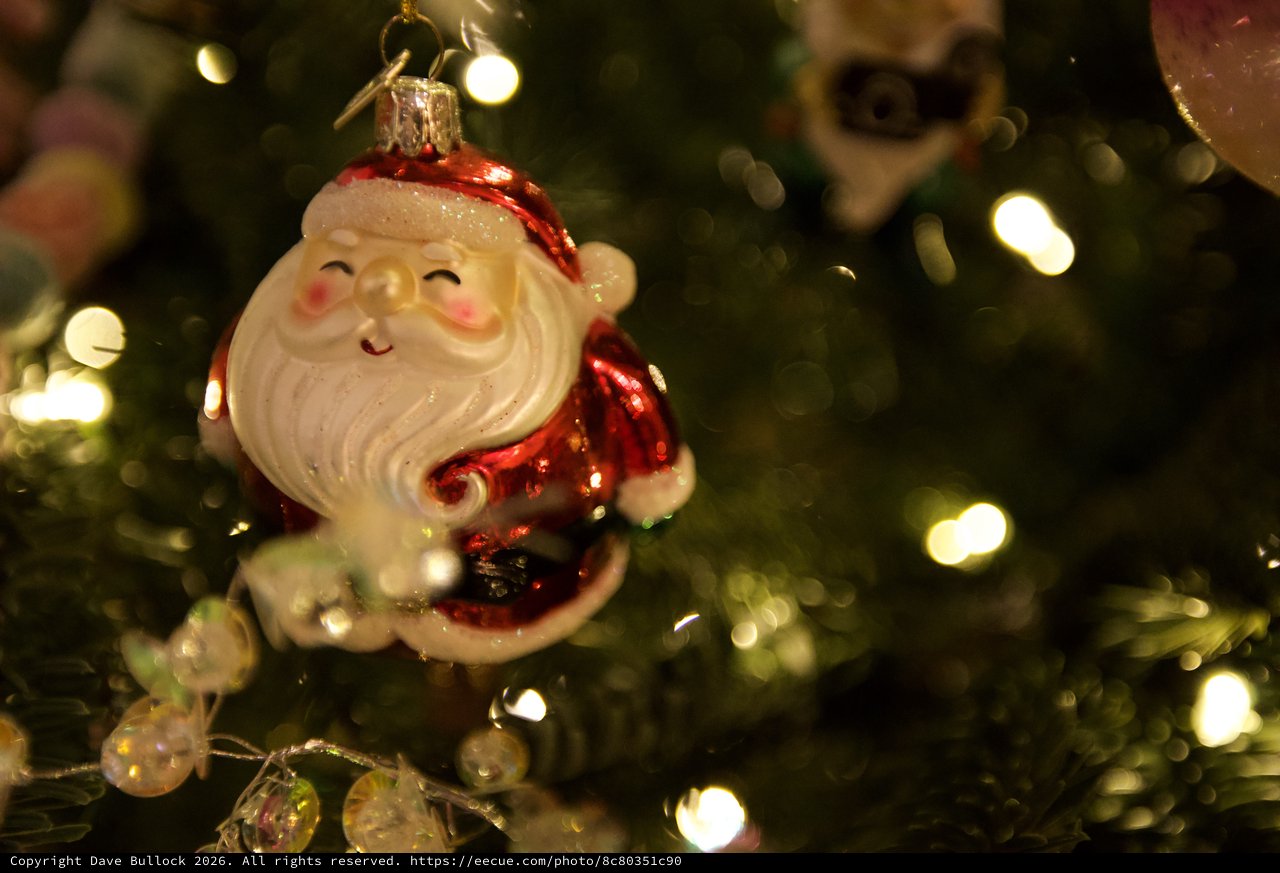 Cheerful Santa Claus Christmas Tree Ornament with Bokeh Lights